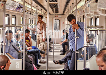 Tehran, Iran - April 29, 2017: Iranian man leans on the rail in the underground. Stock Photo