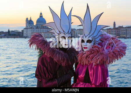 Two costumed people during the Carnival of Venice (Carnevale di Venezia) in Venice, Italy Stock Photo