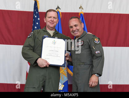 Maj. Gen. Richard Scobee, Air Force Reserve Command vice commander, and Col. Kurt Gallegos, the former 944th Fighter Wing commander, pose with Gallegos’ retirement certificate June 3 during the retirement ceremony at Luke Air Force Base, Arizona. (U.S. Air Force Stock Photo