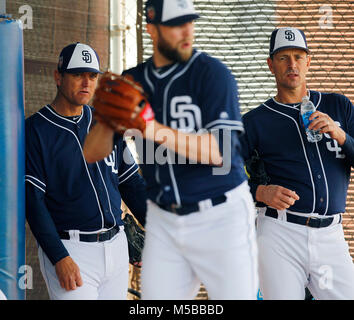 San Diego Padres Trevor Hoffman yawns while his son, Quinn Hoffman, 7,  leans against him as they sit in the outfield at spring training, Friday,  Feb. 25, 2005, in Peoria, Ariz. (AP