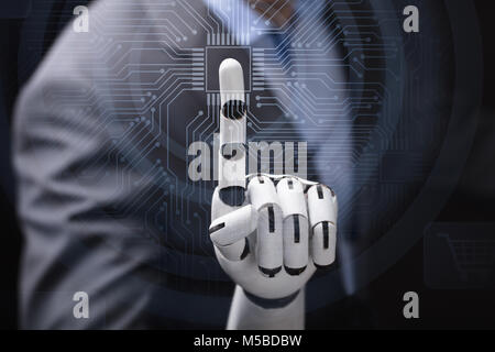 Close-up Of A Businessperson With Robotic Arm Touching Abstract Transparent Computer Micro Chip Stock Photo
