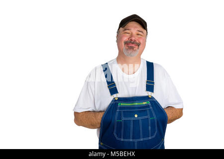 Portrait of cheerful man wearing dungarees against white background Stock Photo