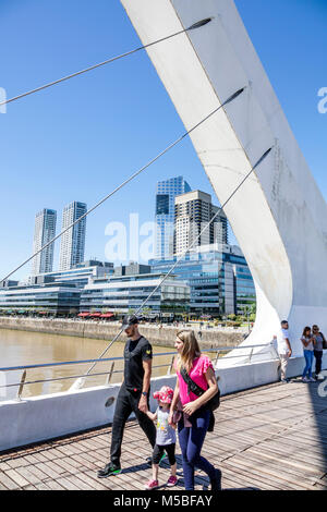 Buenos Aires Argentina,Puerto Madero,Rio Dique,water,riverfront,city skyline,Puente De La Mujer,pedestrian suspension swing bridge designed architect Stock Photo