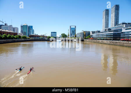 Buenos Aires Argentina,Puerto Madero,Rio Dique,water,riverfront,city skyline,view from Puente De La Mujer,kayak rowing,ARG171125294 Stock Photo