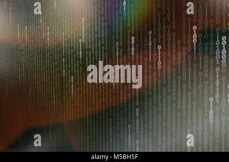 Computer AI intelligence data internet connection concepts. binary code numbers background on computer monitor for computer technology concepts. Priva Stock Photo