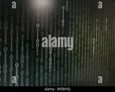 Computer AI intelligence data internet connection concepts. binary code numbers background on computer monitor for computer technology concepts. Priva Stock Photo