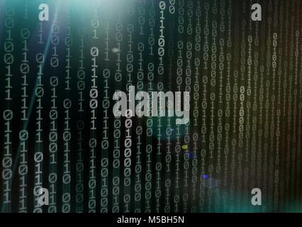 Computer AI intelligence data internet connection concepts. binary code numbers background on computer monitor for computer technology concepts. Priva Stock Photo