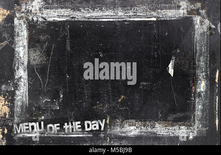 'Menu of the day' chalkboard background. Weathered and distressed template. It can be used as a food menu, poster, wallpaper and more. Stock Photo