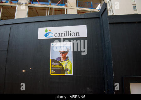 Carillion sign on a deserted building site, Salford, Greater Manchester. Carillion plc is a British multinational facilities management and constructi Stock Photo