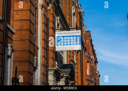 London, United Kingdom, February 17, 2018 : The front entrance of Great Ormond Street Hospital for Children in Bloomsbury with an information sign in the foreground Stock Photo