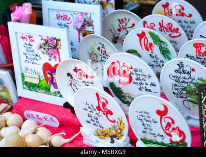 Written speaker sentence Lunar New Year art of ceramics with text 'Happy, Merit, Fortune, Longevity, Peace' in Vietnamese used to decorate indoors Stock Photo