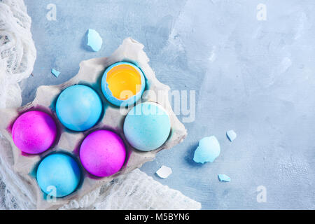 Close-up of fresh Easter eggs in a paper tray. Top view with copy space. Stock Photo