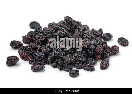 Heap of dried currants isolated on white background Stock Photo