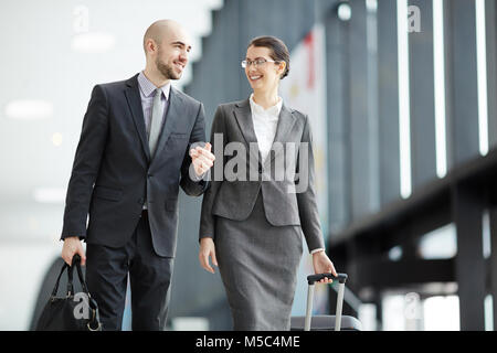 Colleagues in airport Stock Photo
