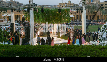 Evening or night time view of A wedding party outside in the grounds of  the Mena House Hotel, Giza, Cairo, Egypt, North Africa Stock Photo