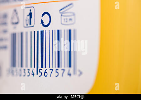 Barcode numbers with garbage symbol and symbol for recycling on a plastic product in a store Stock Photo