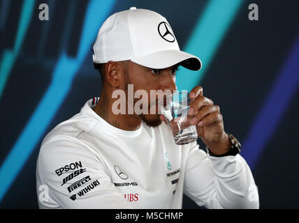 Mercedes driver Lewis Hamilton attending a press conference during the Mercedes-AMG F1 2018 car launch at Silverstone, Towcester. Stock Photo