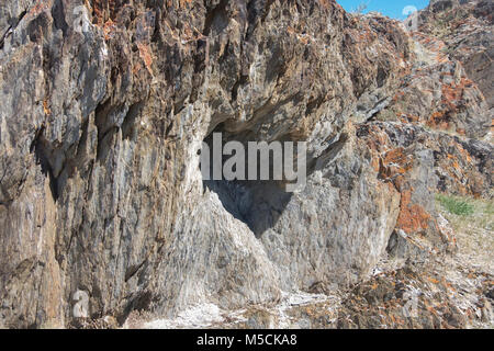 Sharp and dangerous rocks composed of sedimentary rocks Stock Photo