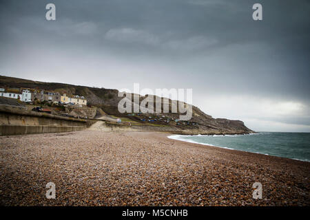 WEYMOUTH, DORSET, UK - DECEMBER 26. 2017. Dark skies over Chesil famous for its pebble beach in Weymouth, a coastal town in the county of Dorset, Engl Stock Photo