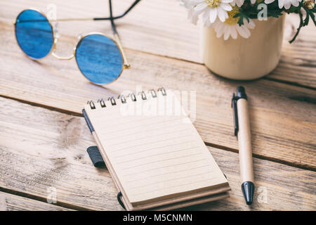 Blank empty notebook, wooden background, view from above, space for text Stock Photo