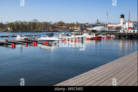 Pleasure motor boats moored in Stockholm city, Sweden Stock Photo
