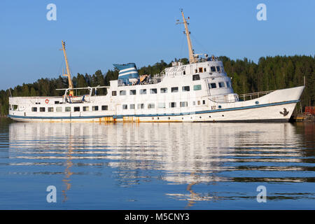 Moored old white passenger ship on the coast of Saimaa lake, Finland Stock Photo
