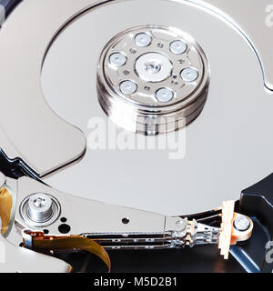 head and platter in internal 3.5-inch sata hard disk drive close up Stock Photo