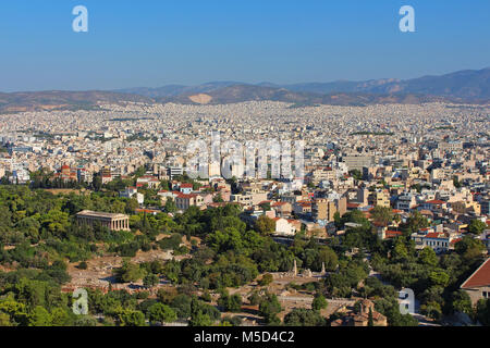 View of ancient temple of Hephaestus in Agora and city of Athens in Greece Stock Photo