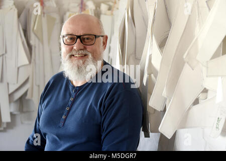 Businessman Ivo Tichy poses with materials for his brand products Don Quiet, Racing ski clothes and ski suits, in Neratov, Czech Republic, on February 22, 2018. Tichy's company Don Quiet dressed Czech athletes of the Czech Olympic Team for the 2018 Winter Olympics in Pyeongchang, South Korea. Czech alpine skier Ester Ledecka won the golden Olympic medal in a Don Quiet ski overall in Women's super-G Alpine skiing. (CTK Photo/Josef Vostarek) Stock Photo