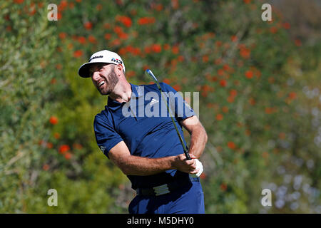 dustin-johnson-hits-his-tee-shot-on-the-second-hole-during-the-first