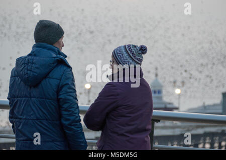 Blackpool, Lancashire,  UK,  22nd February 2018.UK Weather news. A cold evening in Blackpool as huge numbers of Starlings dance the day away producing a magical sight as the 'murmuration'continues into dusk. copyright Gary Telford/Alamy live news Stock Photo