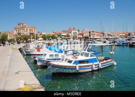 Small boats moored in the harbour at Aegina Town on the Greek island of Aegina on April 26, 2017. The island is a popular destination for Athenians. Stock Photo