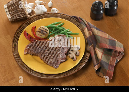 Grilled Porterhouse Steak On Plate Stock Photo