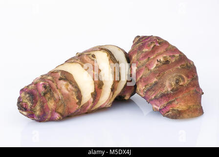 Topinambur root  isolated on white background. Also known as Jerusalem artichoke (Helianthus tuberosus). Edible rhizome native to North America with a Stock Photo