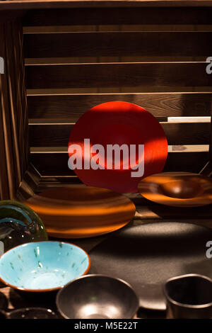 kitchen tools, plate, red background, red, blue, shine, stand, tree, box, yellow, kitchen, the black Stock Photo