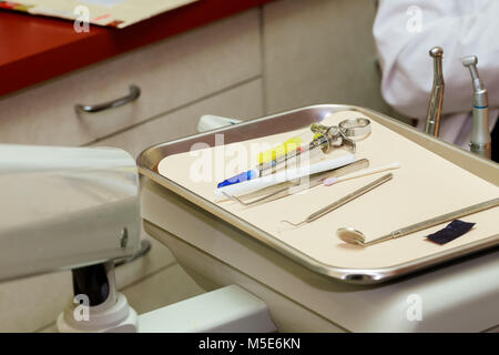 Different dental instruments and tools in a dentists office. Stock Photo