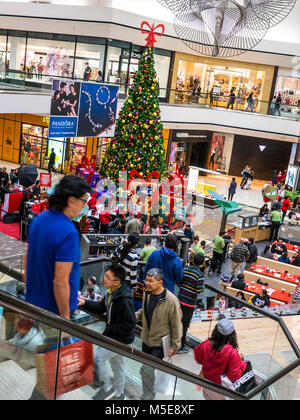 MACEY’S DEPARTMENT STORE INTERIOR CHRISTMAS beautifully decorated Christmas Tree and shoppers at Macey's Store Plaza, Pleasanton California USA Stock Photo