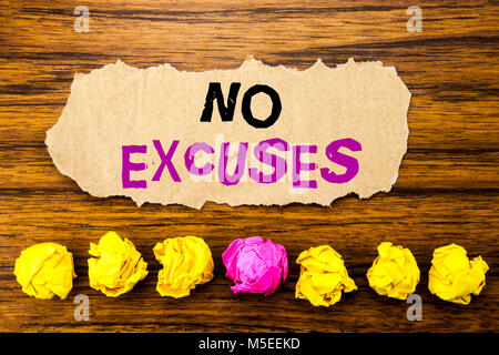 Handwriting text   No Excuses. Concept for Stop Ban for Excuse Written on sticky paper reminder, wooden background with sticky, one folded paper alone Stock Photo