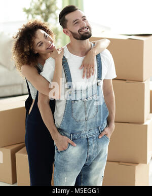 Happy married couple examines a new apartment Stock Photo