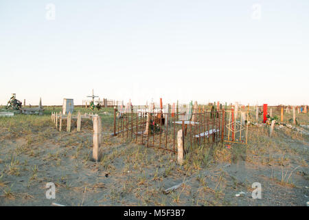 Lavrentiya, Chukotski region, Russia - Settlement Lavrentiya, June 16, 2017: Crosses, monuments and gravestones on a cemetery. Stock Photo