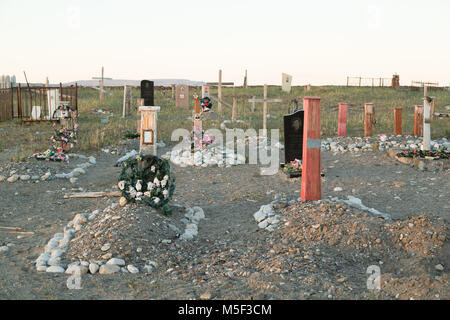 Lavrentiya, Chukotski region, Russia - Settlement Lavrentiya, June 16, 2017: Crosses, monuments and gravestones on a cemetery. Stock Photo