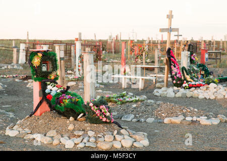 Lavrentiya, Chukotski region, Russia - Settlement Lavrentiya, June 16, 2017: Crosses, monuments and gravestones on a cemetery. Stock Photo