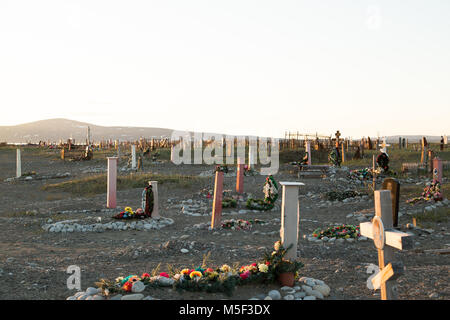 Lavrentiya, Chukotski region, Russia - Settlement Lavrentiya, June 16, 2017: Crosses, monuments and gravestones on a cemetery. Stock Photo