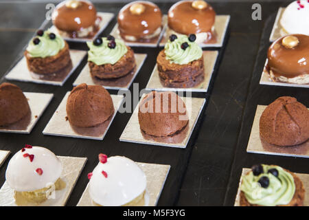 lot of different sweets on the table Stock Photo