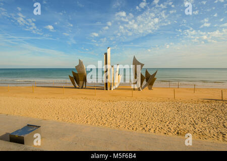 The WW2 American D-Day landing Omaha Beach monument Les Braves Memorial on the sandy beach at Saint-Laurent-sur-Mer at Normandy, France Stock Photo