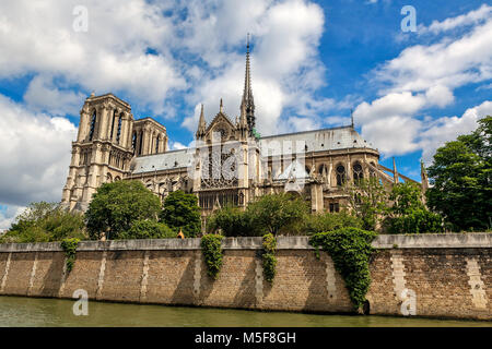 View of famous Notre-Dame de Paris Cathedral under beautiful sky in Paris, France. Stock Photo