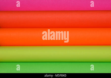 Vibrant coloured paper rolls Stock Photo