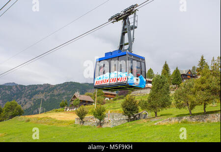 CHAMOIS, ITALY, SEPTEMBER 4, 2017 - Cableway from Buisson to Chamois, the village in Val D'Aosta, Italy. Its peculiarity is that cars are not allowed  Stock Photo