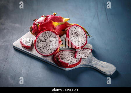 Pitahaya or dragon fruit on blue background Stock Photo