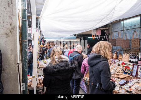 Tourists discovering the market hall in Porto, Portugal Stock Photo